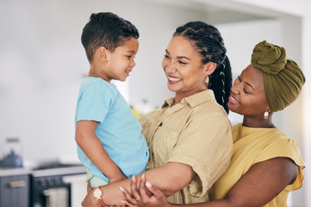 same-sex couple with adopted son